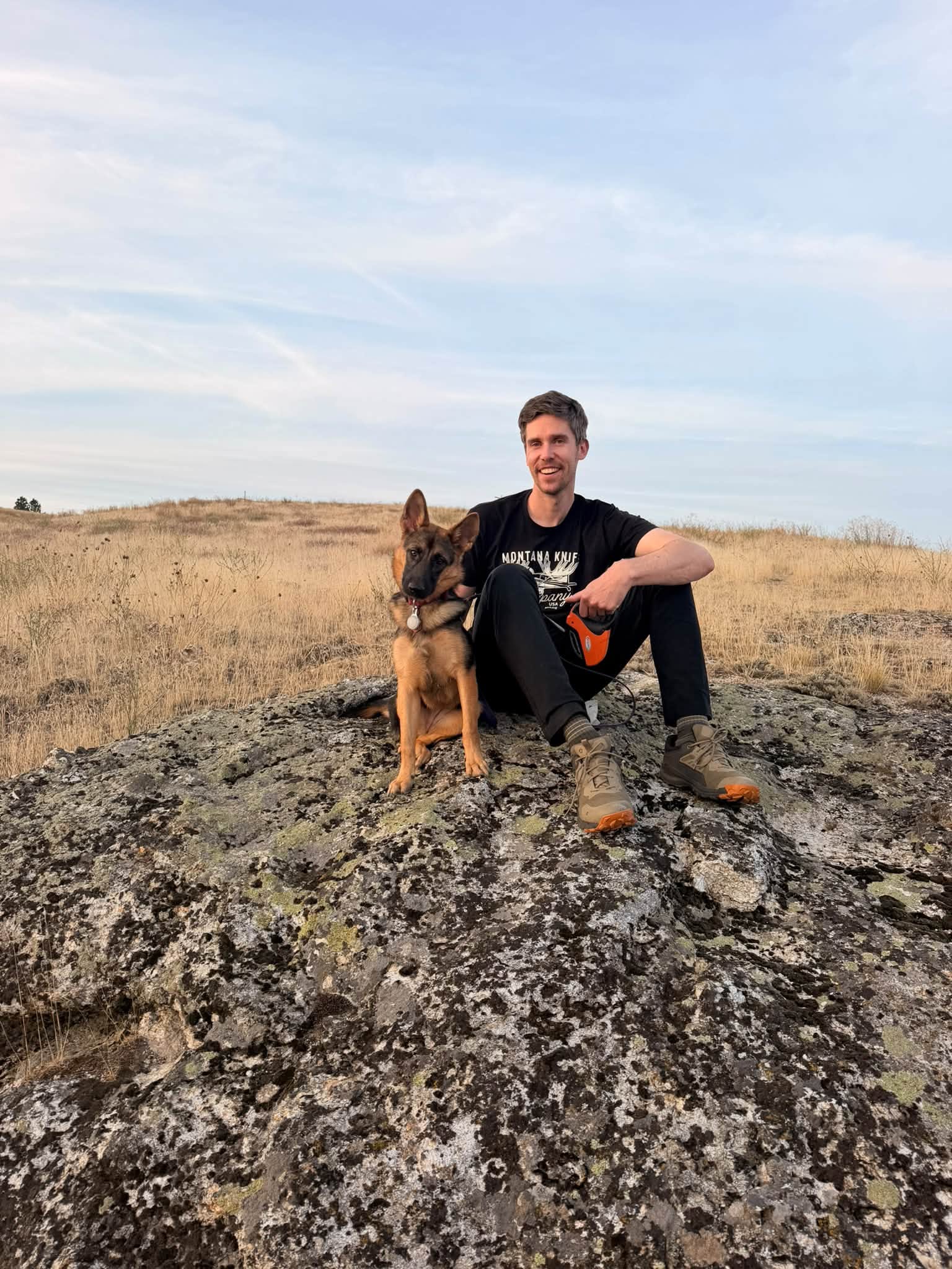 A rescue supporter spending time outdoors with a dog
