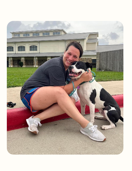 Texas foster volunteer spending time with a rescue dog